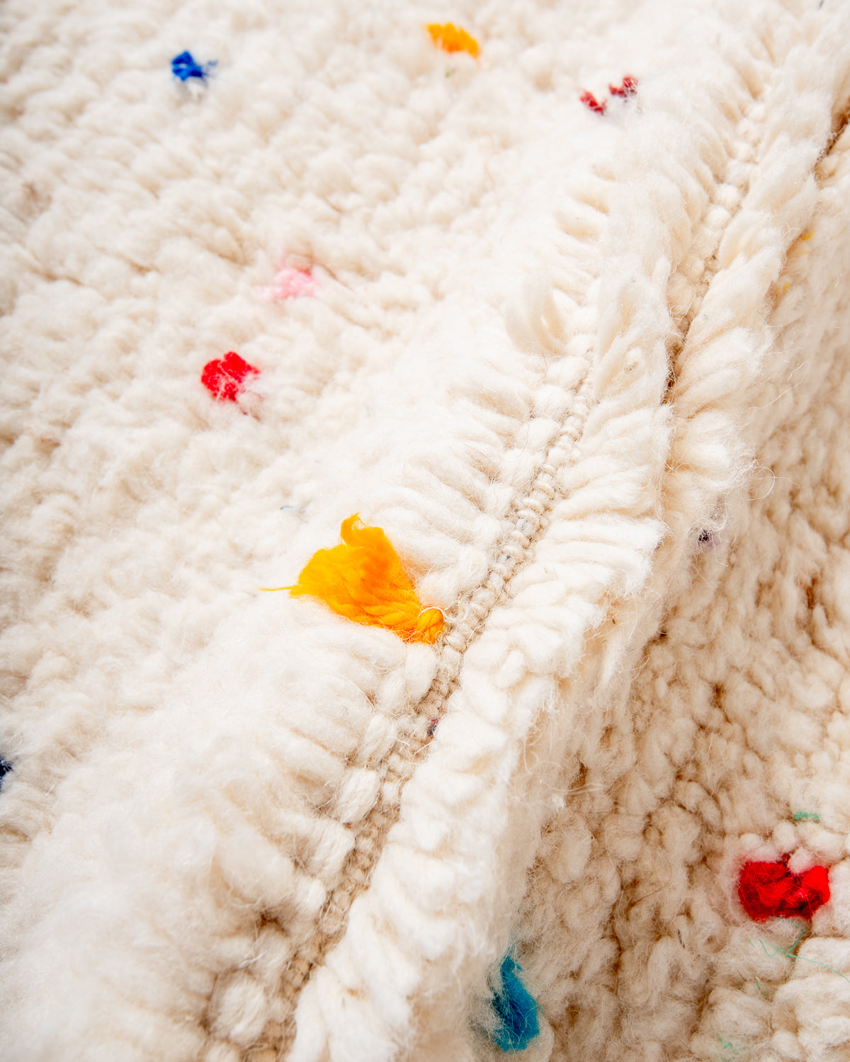 Modern, designer, handcrafted Berber rug from Morocco. Beniourain carpet with beautiful colours and patterns and fluffy wool texture.